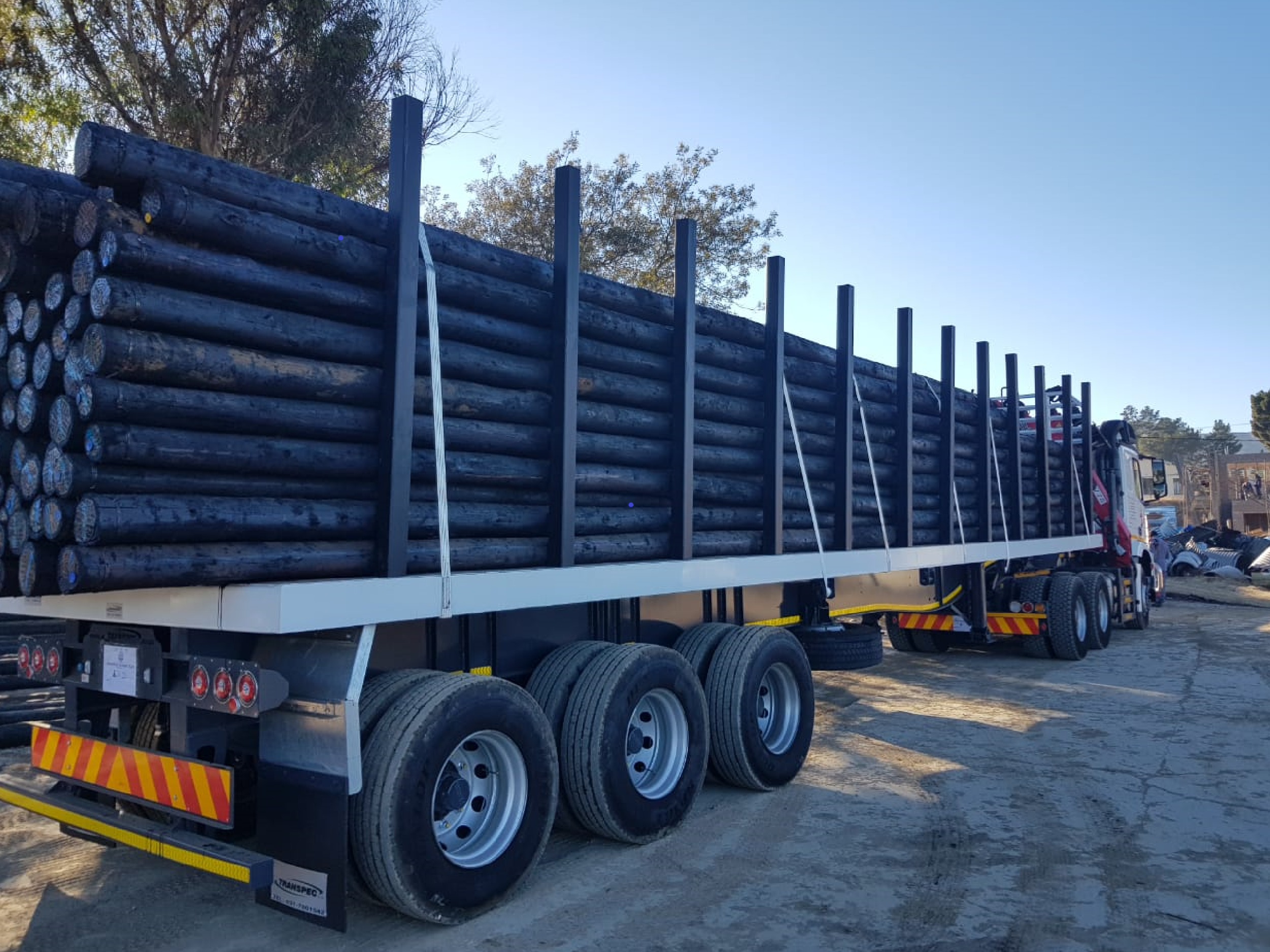Utility pole transport truck